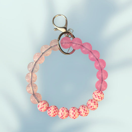 Pink checkered charm wristlet keychain